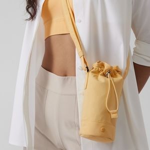 Athleta Coffee Run Water Bottle Sling Yellow